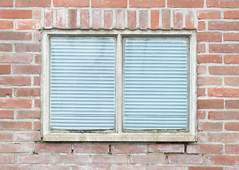 Image showing Old vintage brick wall with window