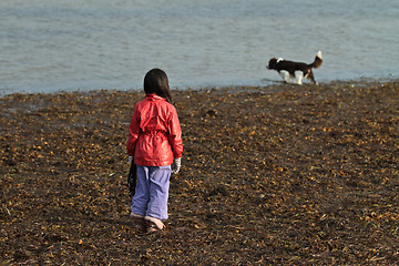 Image showing Child and dog