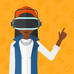 Image showing Woman wearing virtual reality headset.