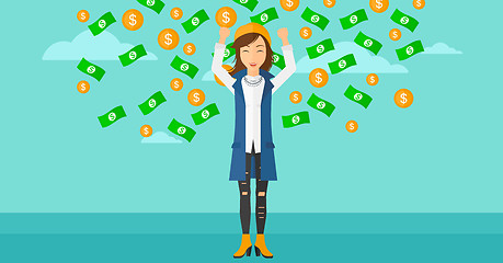 Image showing Happy woman with  flying money. 