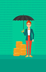 Image showing Woman with umbrella protecting money.