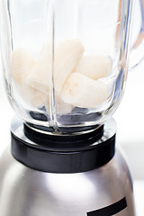 Image showing close up of blender shaker with bananas