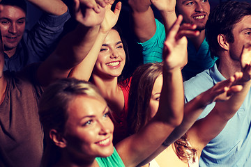 Image showing smiling friends at concert in club