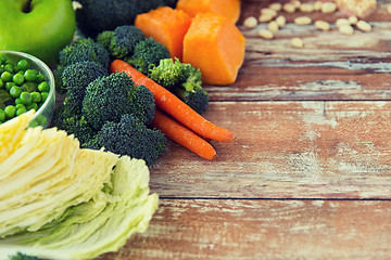 Image showing close up of ripe vegetables on wooden table