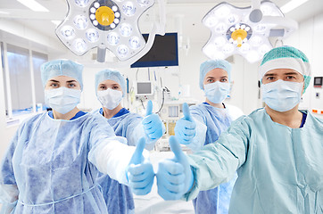 Image showing group of surgeons in operating room at hospital