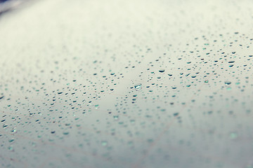 Image showing close up of wet rear car glass