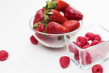 Image showing close up of ripe red strawberries and raspberries