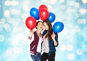 Image showing happy teenage girls with helium balloons