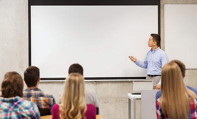 Image showing group of students and teacher in classroom