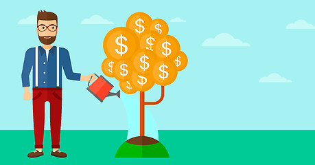 Image showing Man watering money tree.