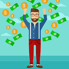 Image showing Happy man with  flying money. 