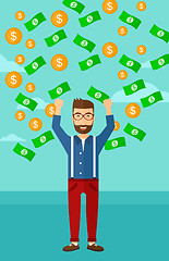 Image showing Happy man with  flying money. 