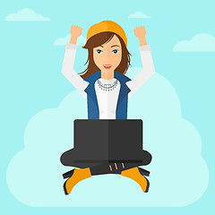 Image showing Woman sitting on cloud with laptop.