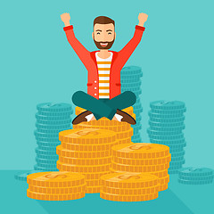 Image showing  Happy businessman sitting on coins.