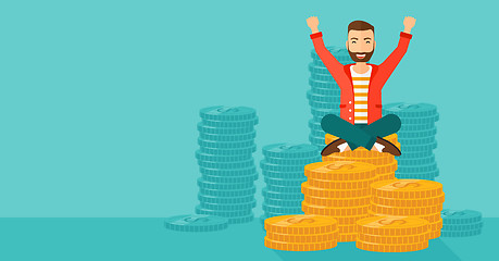 Image showing  Happy businessman sitting on coins.