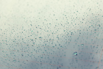 Image showing close up of wet rear car glass