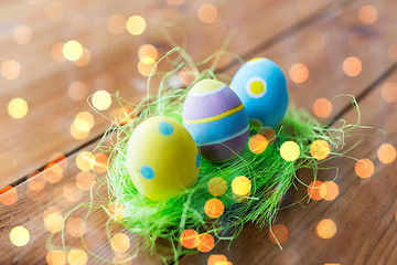 Image showing close up of colored easter eggs and grass