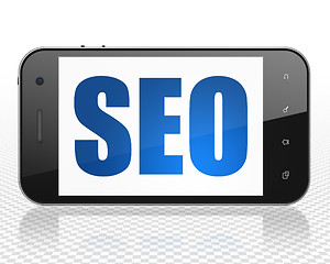 Image showing Web design concept: Smartphone with SEO on display