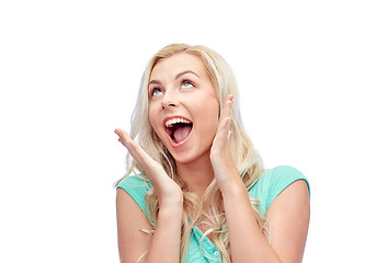 Image showing surprised smiling young woman or teenage girl