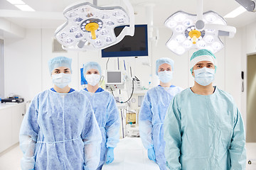 Image showing group of surgeons in operating room at hospital