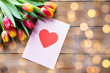 Image showing close up of flowers and greeting card with heart