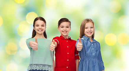 Image showing happy children showing thumbs up