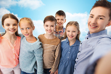 Image showing happy children talking selfie