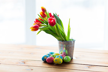 Image showing close up of easter eggs and flowers in bucket