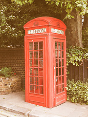 Image showing Retro looking Red phone box in London