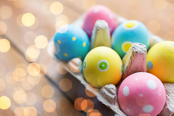 Image showing close up of colored easter eggs in egg box