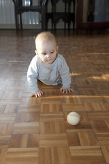 Image showing Baby girl playing