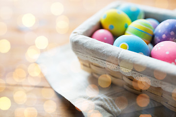 Image showing close up of colored easter eggs in basket