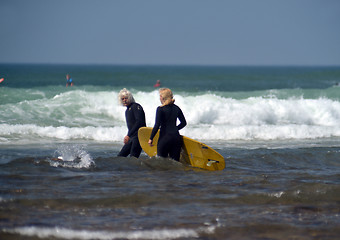 Image showing editorial couple surfers Ditch Plains Montuak New York