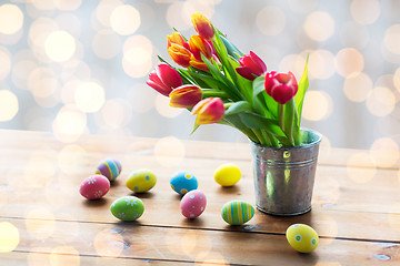 Image showing close up of easter eggs and flowers in bucket