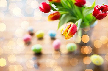 Image showing close up of easter eggs and flowers in bucket