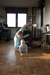 Image showing Baby girl with her father