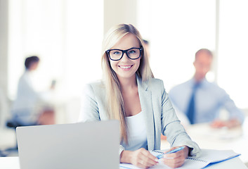 Image showing businesswoman with documents in office