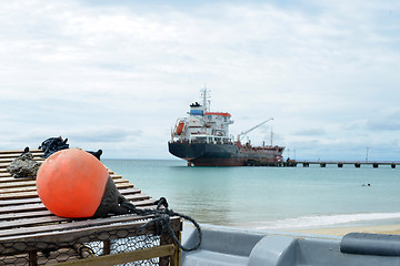 Image showing oil tanker ship at dock with lobster pot trap and buoy  Picnic C