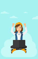 Image showing Woman sitting on cloud with laptop.