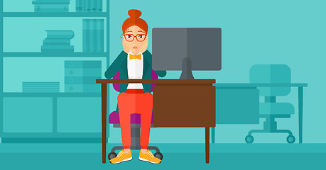 Image showing Tired employee sitting in office.