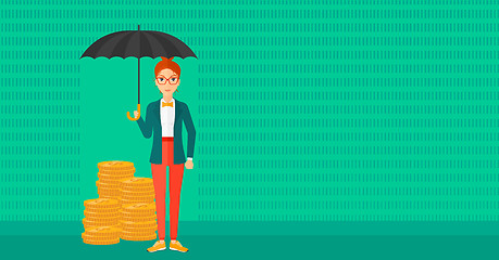 Image showing Woman with umbrella protecting money.