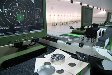 Image showing air rifle and 10m target monitor