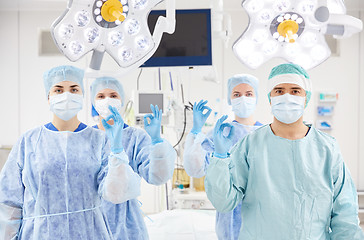 Image showing group of surgeons in operating room at hospital