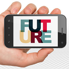 Image showing Time concept: Hand Holding Smartphone with Future on  display