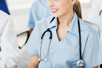 Image showing close up of doctor with stethoscope at seminar