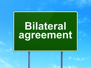 Image showing Insurance concept: Bilateral Agreement on road sign background