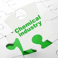 Image showing Manufacuring concept: Chemical Industry on puzzle background