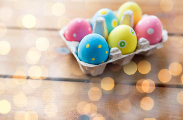 Image showing close up of colored easter eggs in egg box