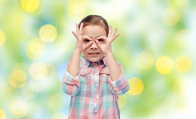 Image showing happy little girl making faces and having fun