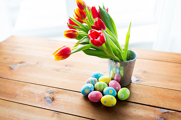 Image showing close up of easter eggs and flowers in bucket